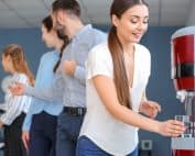 Colleagues rent a water cooler for the office